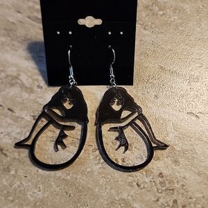 Woman Sitting Earrings